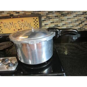 Presto Stainless Steel Pressure Cooker 6-Quart NEVER USED. No BOX. Instructions